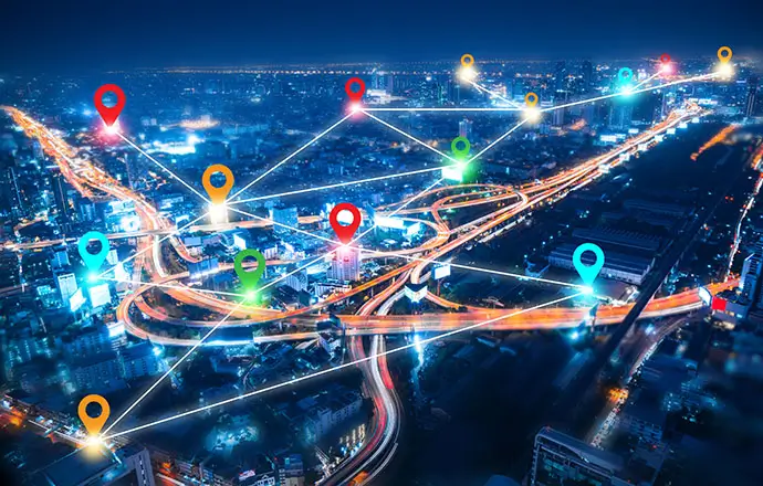 colorful pin landmark location on aerial view of modern downtown skyline and highway transportation in modern city with location link network connection for meter verse trend worldwide link technology