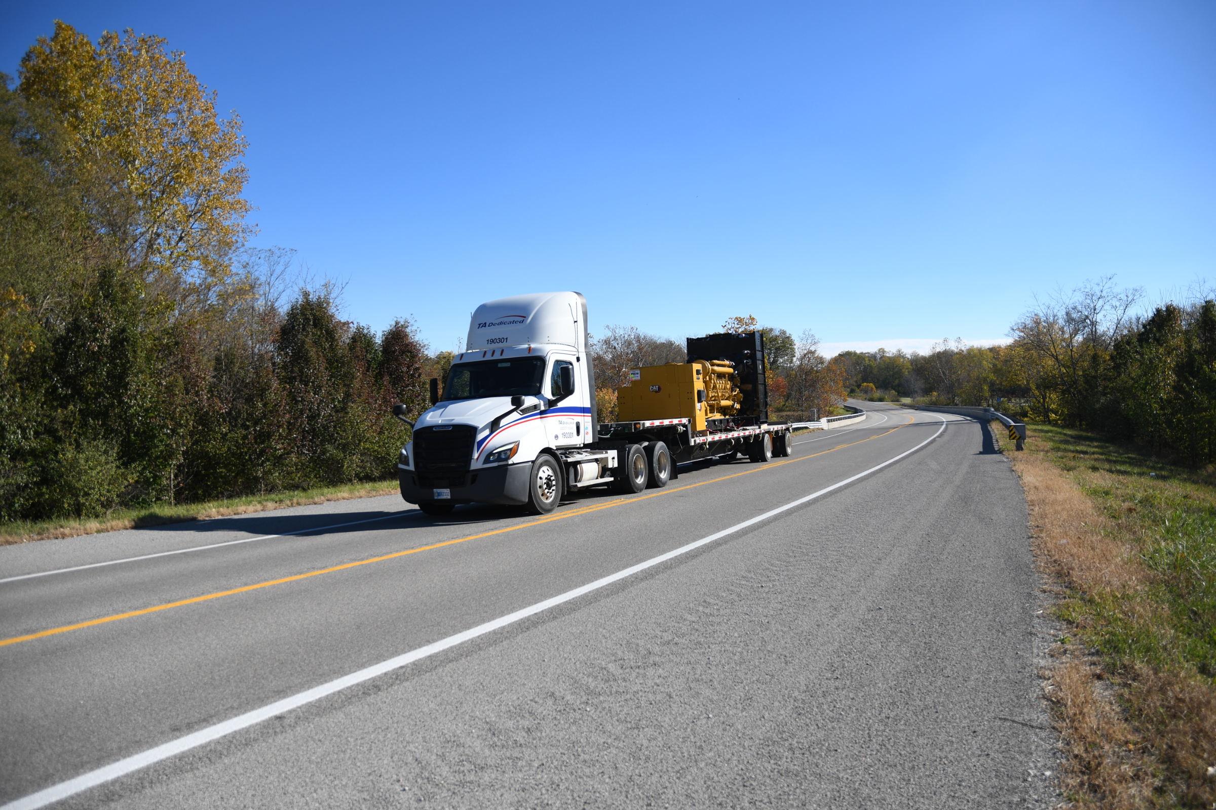 TA Dedicated truck driving as rates rise for flatbed shipments