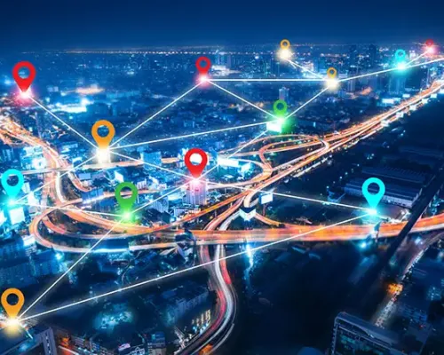 colorful pin landmark location on aerial view of modern downtown skyline and highway transportation in modern city with location link network connection for meter verse trend worldwide link technology